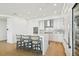 Modern kitchen with white cabinets and large island at 2910 W Barcelona St # 1901, Tampa, FL 33629