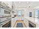 Bright kitchen boasts stainless steel appliances and an island at 2910 W Barcelona St # 1901, Tampa, FL 33629