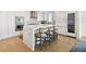 Modern kitchen with white cabinets and a large island at 2910 W Barcelona St # 1901, Tampa, FL 33629