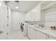 Bright laundry room with ample storage and modern appliances at 2910 W Barcelona St # 1901, Tampa, FL 33629