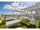 Spacious lounge area with multiple chaise lounges at 2910 W Barcelona St # 1901, Tampa, FL 33629