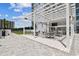 Covered outdoor seating area with modern furniture at 2910 W Barcelona St # 1901, Tampa, FL 33629