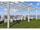 White pergola with seating area overlooking water at 2910 W Barcelona St # 1901, Tampa, FL 33629