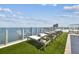 Relaxing pool deck with artificial turf and lounge chairs at 2910 W Barcelona St # 1901, Tampa, FL 33629