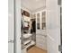 Large walk-in closet with custom shelving and ample storage space at 2910 W Barcelona St # 1901, Tampa, FL 33629