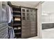 Custom designed walk-in closet with shelving and drawers at 2910 W Barcelona St # 1901, Tampa, FL 33629