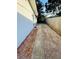 Concrete and brick backyard patio area at 39093 Citadel Cir, Zephyrhills, FL 33542
