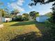 Large grassy backyard with shed at 39093 Citadel Cir, Zephyrhills, FL 33542