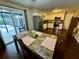 Kitchen and dining area with view to the pool at 39093 Citadel Cir, Zephyrhills, FL 33542