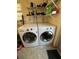 Convenient laundry room with LG washer and dryer at 39093 Citadel Cir, Zephyrhills, FL 33542