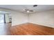 Large living area with hardwood floors and lots of natural light at 39093 Citadel Cir, Zephyrhills, FL 33542