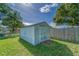 White shed in backyard, good for storage at 39093 Citadel Cir, Zephyrhills, FL 33542