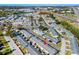 Wide aerial view of community and surrounding area at 5005 Lily Street N Pl, Pinellas Park, FL 33782