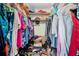 Walk-in closet with ample storage space for clothing and shoes at 5005 Lily Street N Pl, Pinellas Park, FL 33782