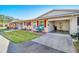 Front view of charming condo with carport at 5005 Lily Street N Pl, Pinellas Park, FL 33782