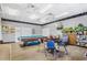 Community game room with pool table and seating at 5005 Lily Street N Pl, Pinellas Park, FL 33782
