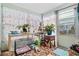 Sunroom with plants and tiled floor at 5005 Lily Street N Pl, Pinellas Park, FL 33782