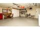 Garage with storage racks, workbench, and bicycles at 550 Boca Ciega Point N Blvd, St Petersburg, FL 33708