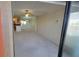 View through doorway into open concept layout with kitchen, living and lanai access at 5764 Baywater Dr # 5764, Tampa, FL 33615