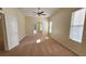 Spacious bedroom with carpet and ceiling fan at 6013 Catlin Dr, Tampa, FL 33647