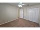 Bedroom with ceiling fan and carpet flooring at 6013 Catlin Dr, Tampa, FL 33647