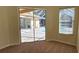 Bedroom with pool view and sliding glass doors at 6013 Catlin Dr, Tampa, FL 33647