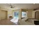 Gathering room with fireplace and pool view at 6013 Catlin Dr, Tampa, FL 33647