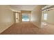 Spacious living room with view of the pool and access to other rooms at 6013 Catlin Dr, Tampa, FL 33647