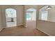 Open living area with views into kitchen and Gathering room at 6013 Catlin Dr, Tampa, FL 33647