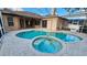 Inviting in-ground pool with spa at 6013 Catlin Dr, Tampa, FL 33647
