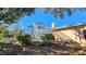 Screened-in pool area with surrounding landscaping at 6013 Catlin Dr, Tampa, FL 33647