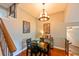 Bright dining area with a four-person table and chandelier at 615 Island Place Way # 615, Tampa, FL 33602