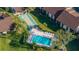 Aerial view of community pool and shuffleboard at 6211 Timber Lake Dr # B8, Sarasota, FL 34243