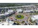 Aerial view of a shopping center with a large roundabout at 6211 Timber Lake Dr # B8, Sarasota, FL 34243