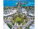 Aerial view of a coastal town with a roundabout and beach at 6211 Timber Lake Dr # B8, Sarasota, FL 34243