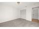 Spacious bedroom with carpet and ample closet space at 6211 Timber Lake Dr # B8, Sarasota, FL 34243