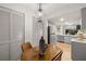 Small dining area with wood table and view of kitchen at 6211 Timber Lake Dr # B8, Sarasota, FL 34243