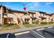 Front view of condo building with parking at 6211 Timber Lake Dr # B8, Sarasota, FL 34243