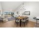 Living room with vaulted ceiling and wood floors at 6211 Timber Lake Dr # B8, Sarasota, FL 34243