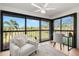 Bright sunroom with golf course view at 6211 Timber Lake Dr # B8, Sarasota, FL 34243