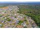 Aerial view showing home's location in a residential neighborhood at 6321 Staunton Dr, Holiday, FL 34690
