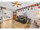 Spacious living room with comfortable seating and access to dining area at 6321 Staunton Dr, Holiday, FL 34690