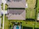 An aerial view of the home's roof and fenced backyard at 6445 Tideline Dr, Apollo Beach, FL 33572