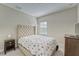 Comfortable bedroom with plush headboard and soft carpet at 6445 Tideline Dr, Apollo Beach, FL 33572