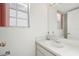 Simple bathroom with single vanity and mirror at 6833 S Wall St, Tampa, FL 33616