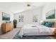 Main bedroom featuring hardwood floors and virtually staged decor at 6833 S Wall St, Tampa, FL 33616