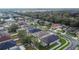 Aerial view showing a house's location in a neighborhood near a park at 7142 Royal George Ct, Wesley Chapel, FL 33545