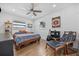 Spacious bedroom with hardwood floors, ceiling fan and ample natural light at 1558 13Th S St, St Petersburg, FL 33705