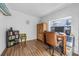 Home office features built-in shelving and wood floors at 1558 13Th S St, St Petersburg, FL 33705