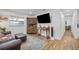 Bright living room features hardwood floors, comfy seating, and stylish decor at 1558 13Th S St, St Petersburg, FL 33705
